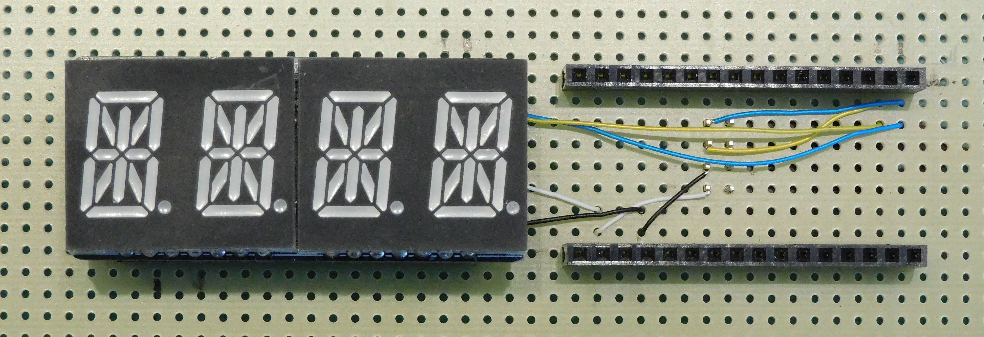 Custom board showing wiring under quad-display